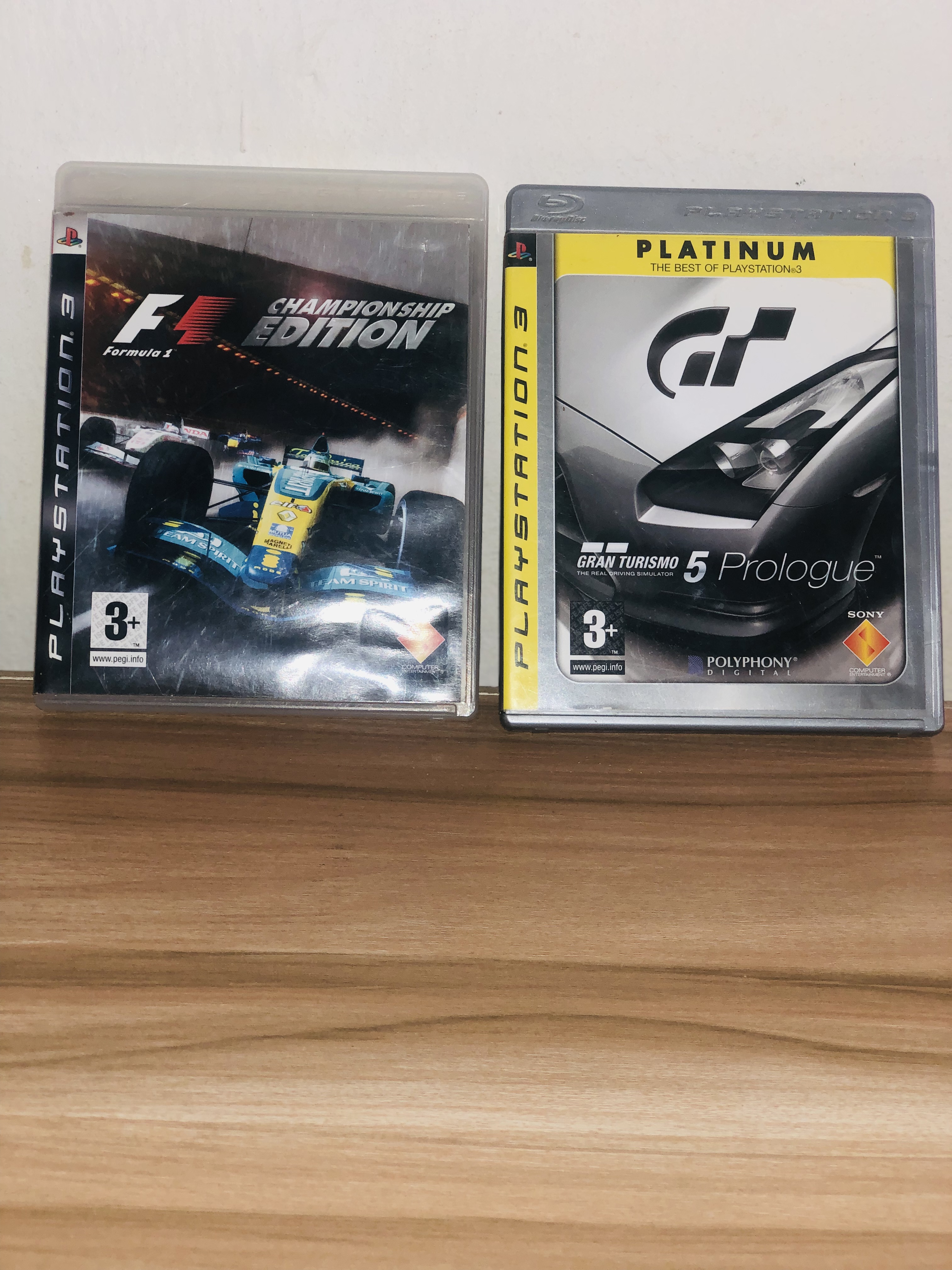 Two Original Play Station 3 Discs for One Game Pad - Deal?